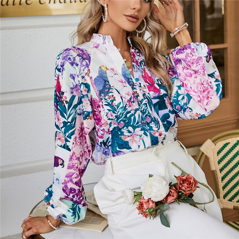 Floral Stand-Collar Balloon-Sleeve Blouse — floral blouse tucked into white shorts