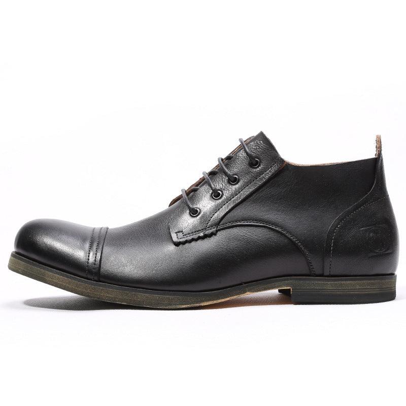 Black leather lace-up ankle boots, side profile with stitched panels and dark rubber sole