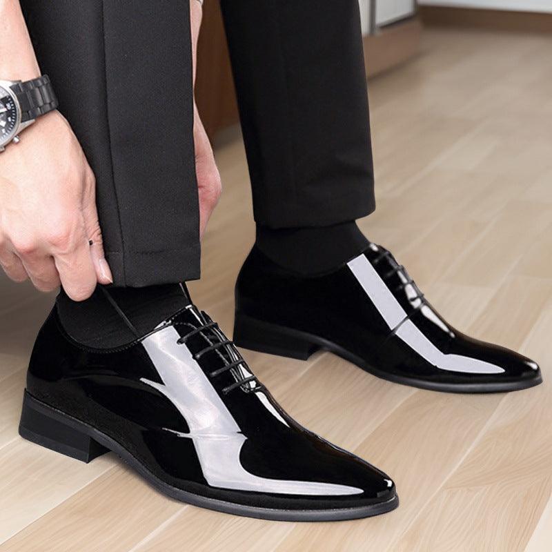 Black men's lace-up shoes with white side stripes and black laces, standing pair