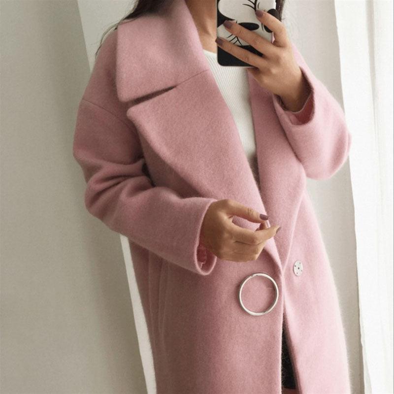 Women's pink wool coat detail, notch lapel, front buttons and large ring trim, long sleeves
