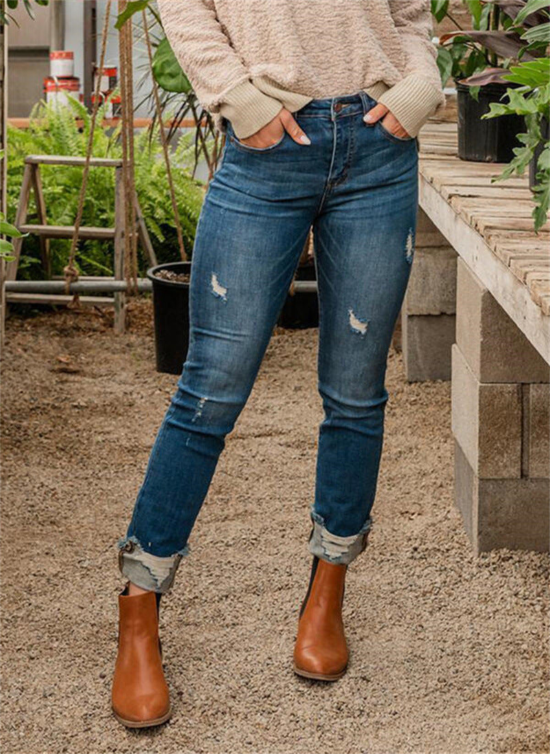 Slim Fit And Torn Blue Jeans For Women - WOMONA.COM