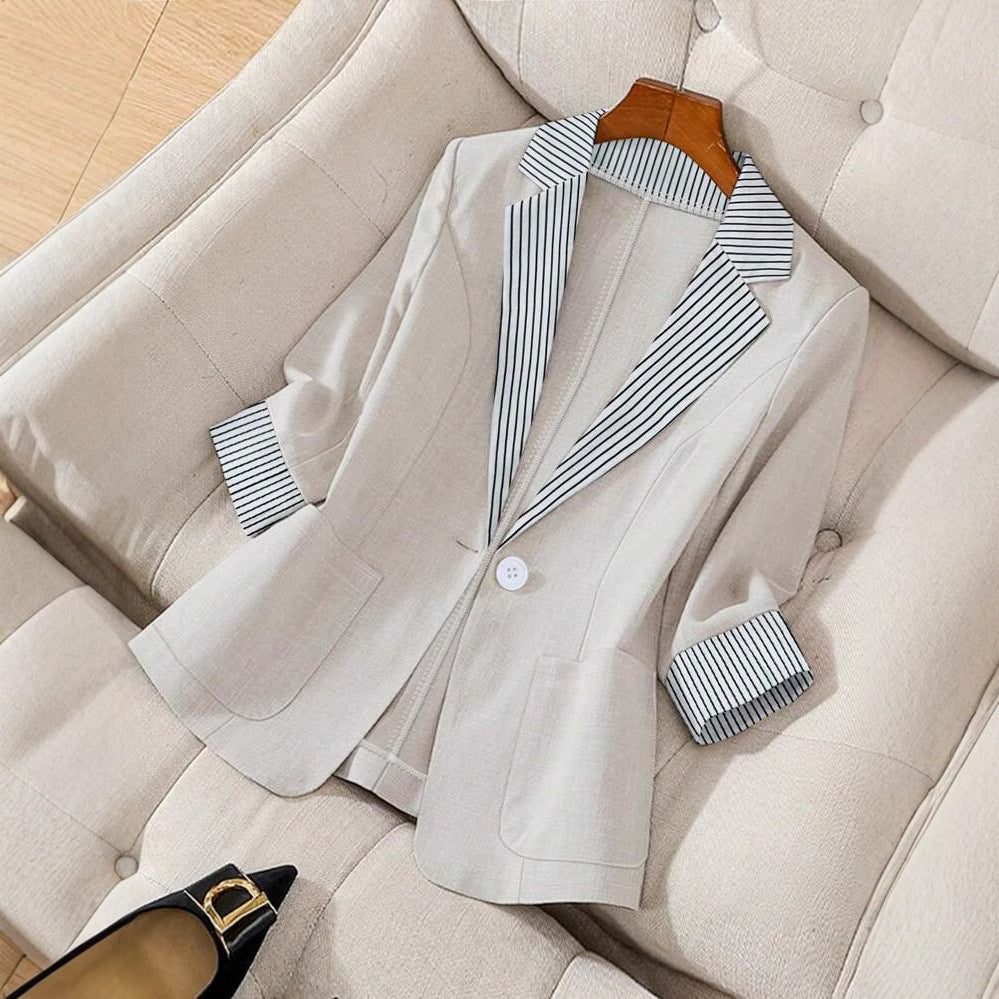 Women’s loose blazer top in light champagne with striped collar and cuffs, button front