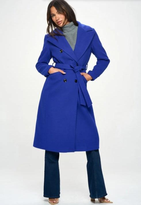 Royal blue longline double-breasted coat with belt and notched lapels, black buttons.