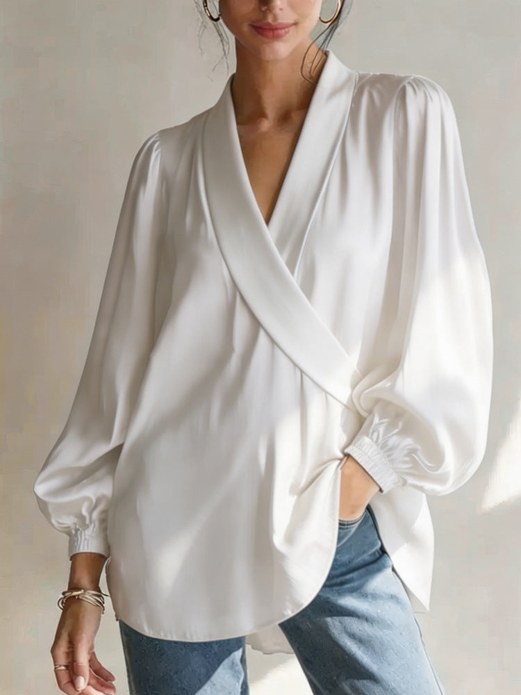 Women's casual white v-neck long-sleeve wrap top with gathered cuffs and tie-front knot