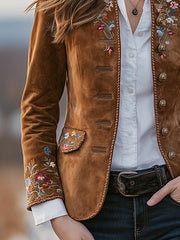 Brown women’s suit jacket with floral embroidered patterned trim and button front