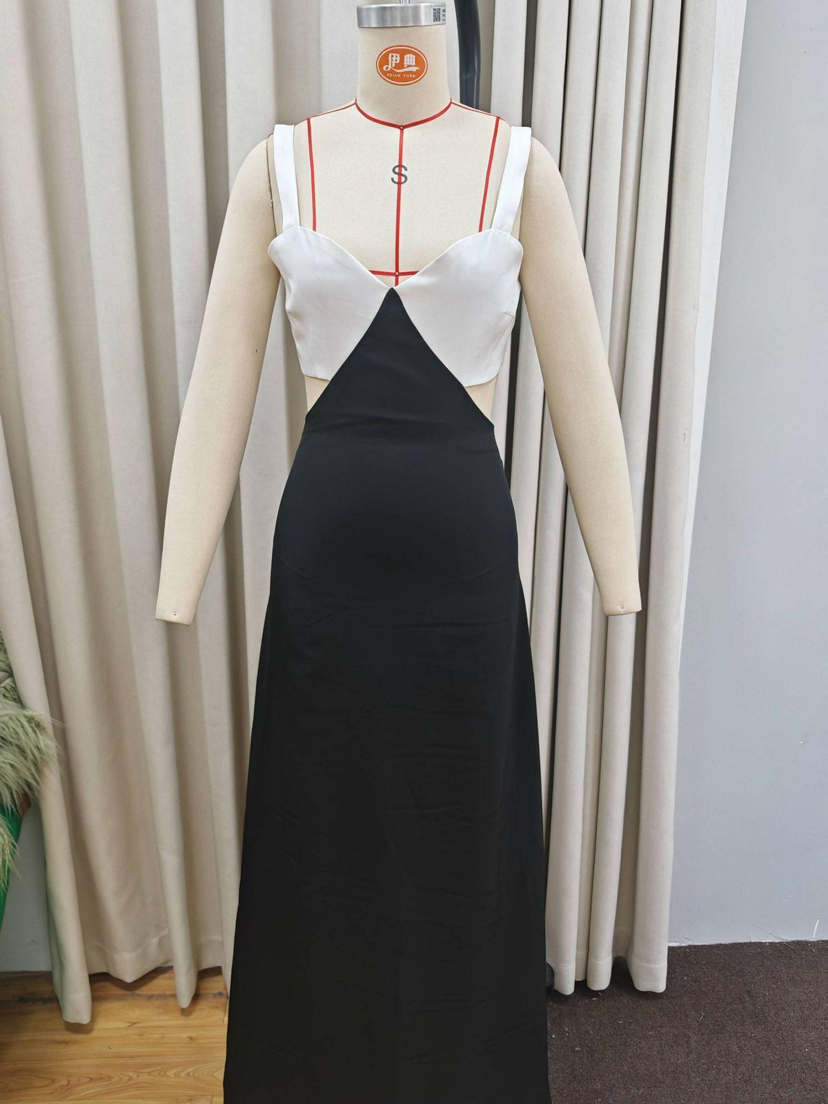 Black maxi suspender dress with cream shoulder panels and center black color patch