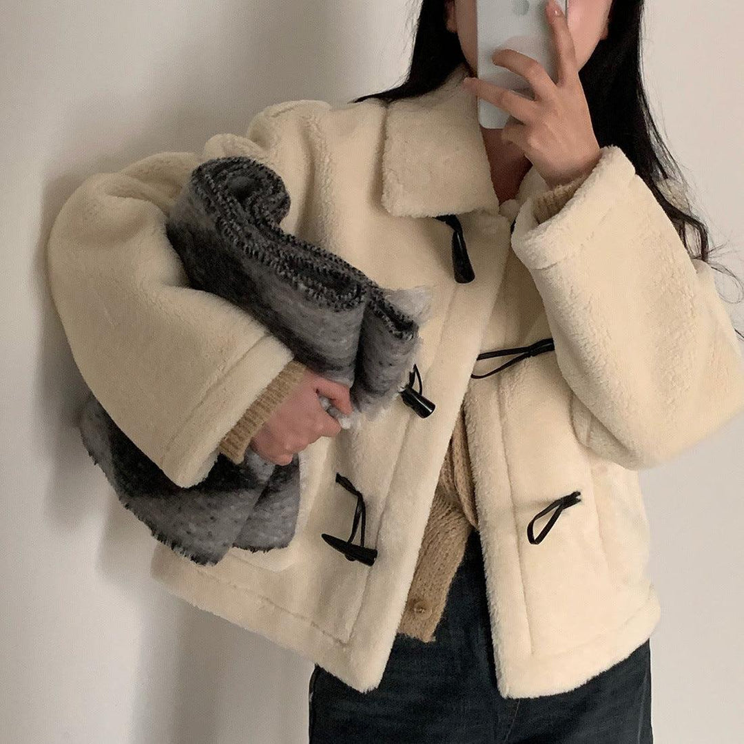 Milky white lambswool short jacket with black duffle toggles and oversized collar