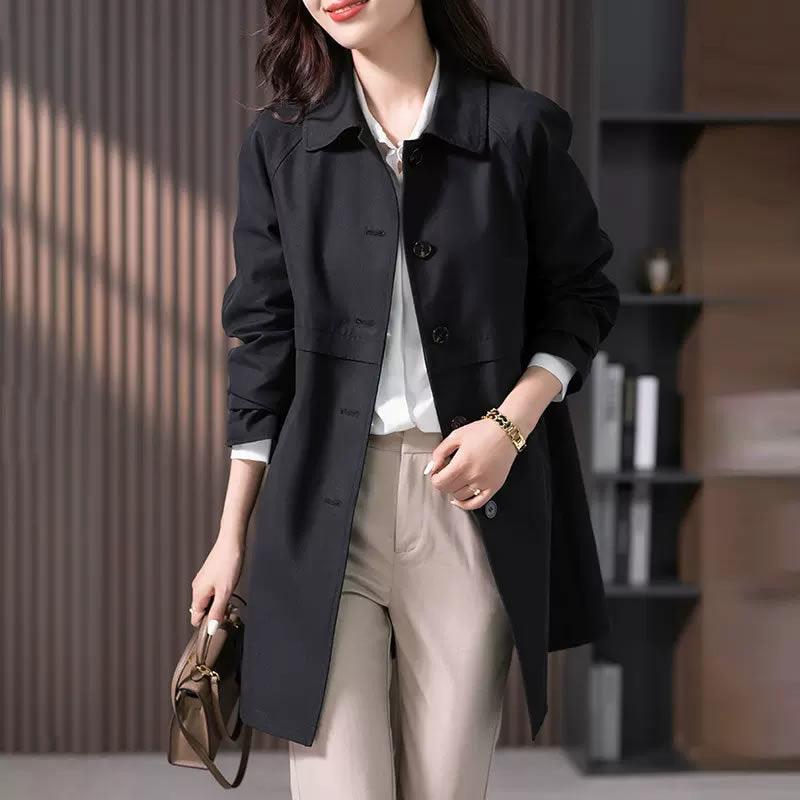 Women’s black mid-length trench coat with double-breasted button front and notched lapel