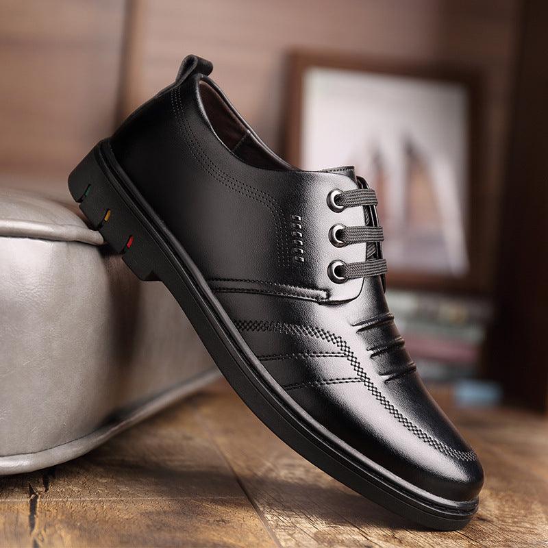 Black leather lace-up oxford shoes with metal eyelets and classic brogue-style stitching