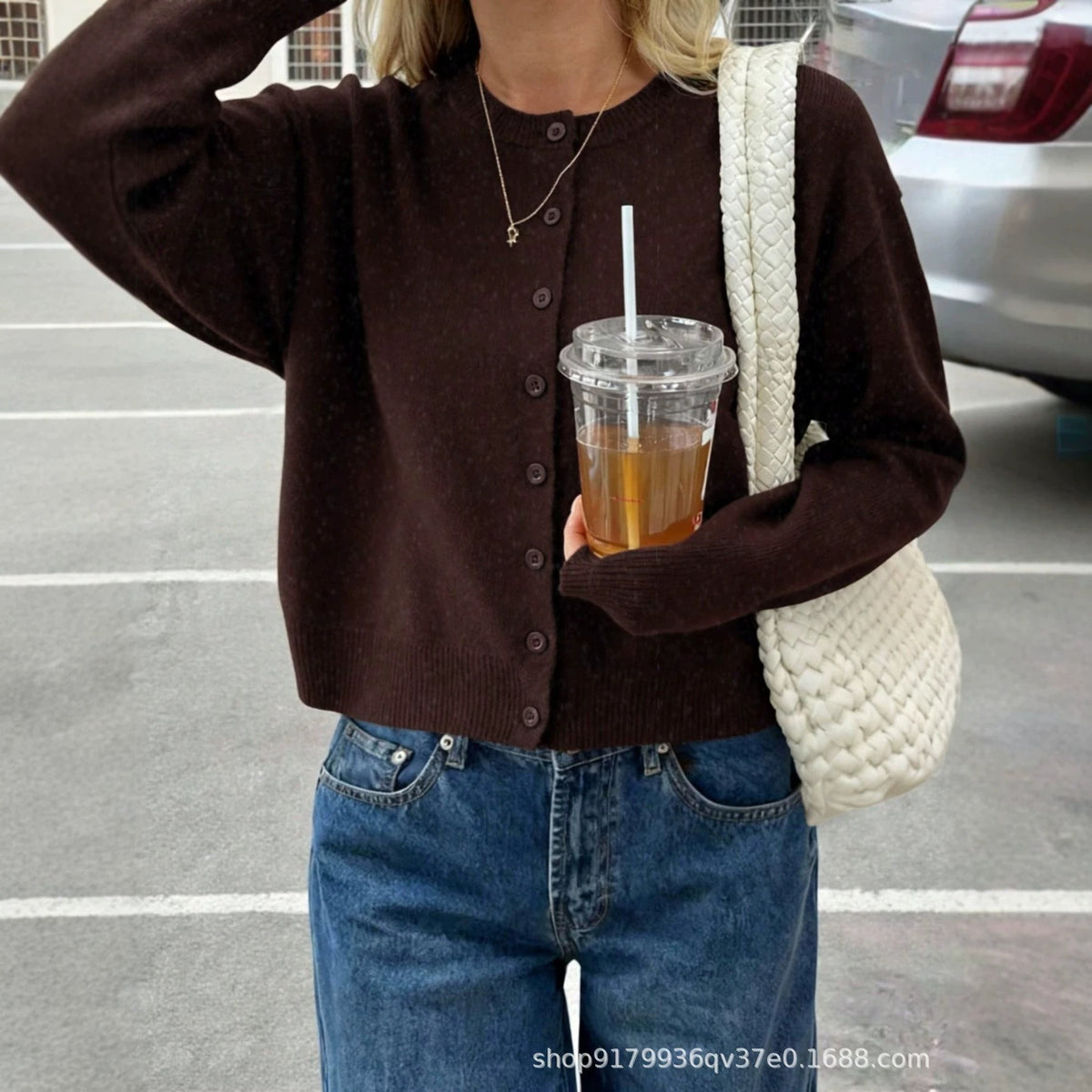 Maroon loose-fit button-front cardigan, round neck, long sleeves, textured knit