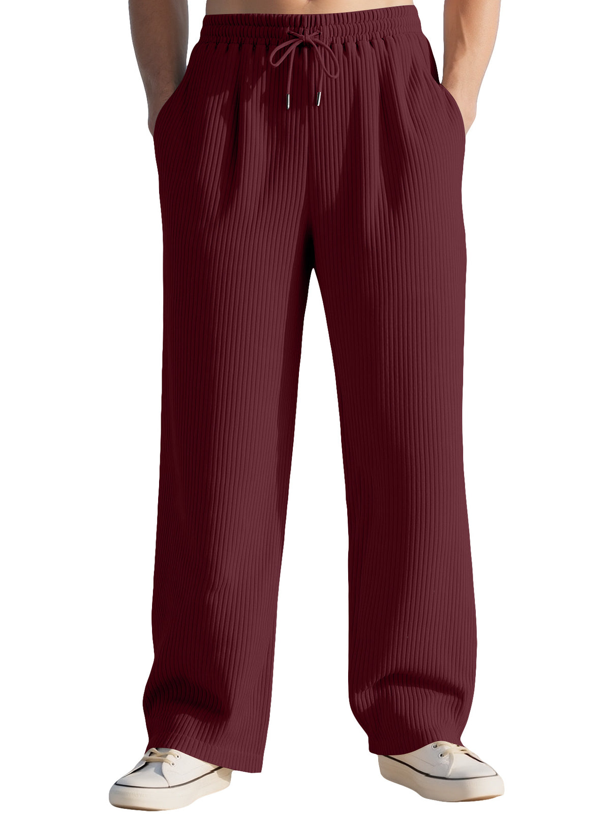Wine red wide-leg sports sweatpants with elastic waistband and drawstring tie detail.