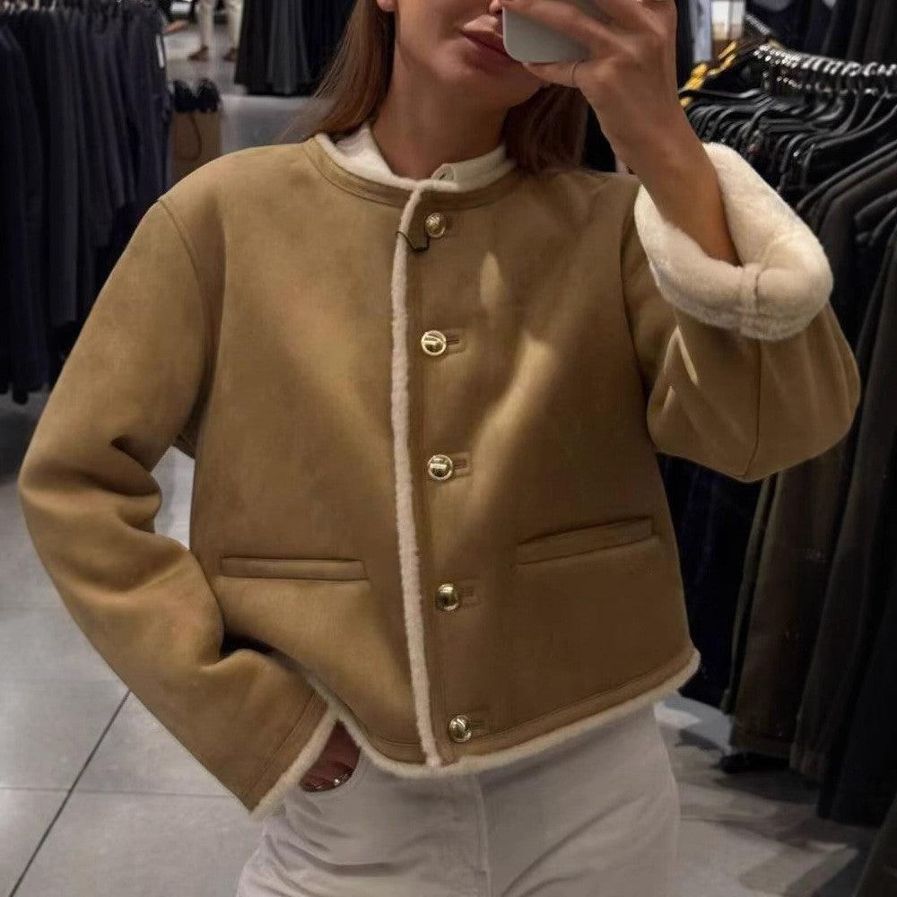 Tan long-sleeve jacket with sherpa trim, snap buttons, and front patch pockets
