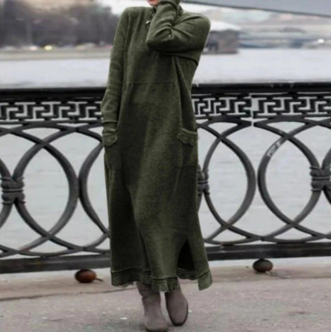 Army green loose knit long dress with long sleeves, cowl neck, and scalloped hem.