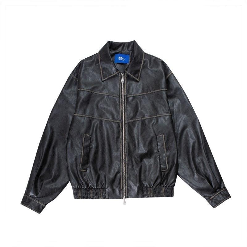 Black PU leather bomber jacket with notch lapels, front zipper, patchwork panels