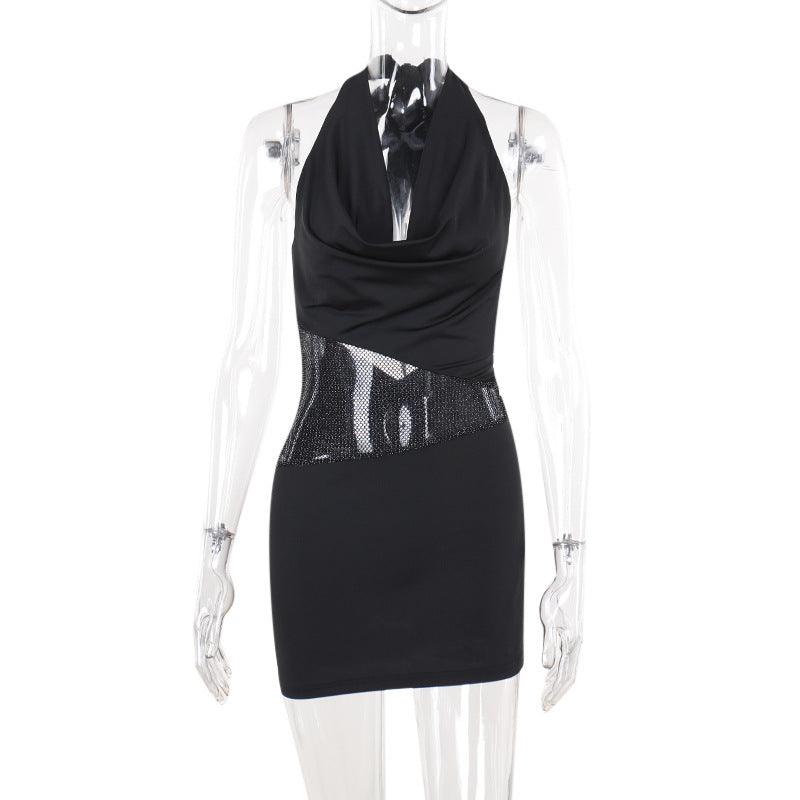 Black halter mini dress on mannequin with draped deep U-neck and glitter waist