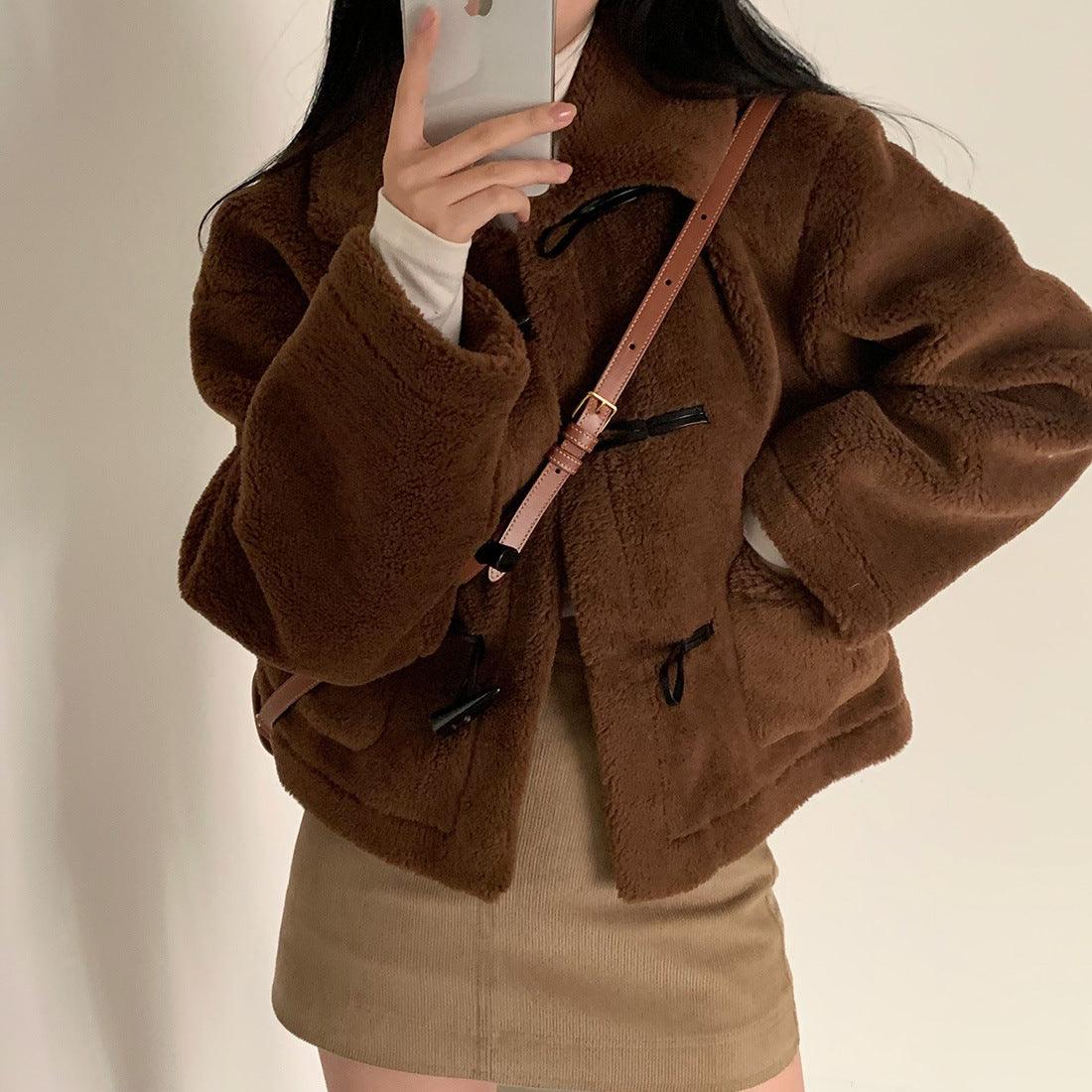Brown lambswool short jacket with front toggle closures and side flap pockets