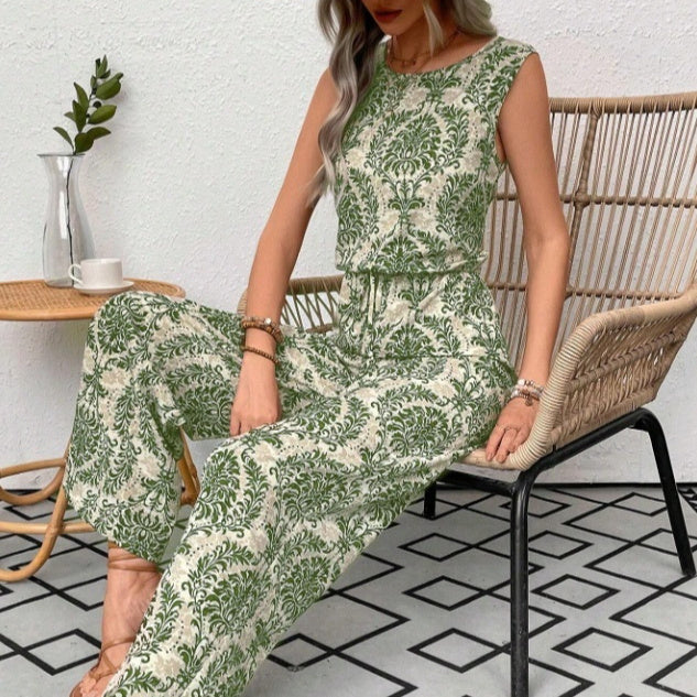Green printed two-piece set with sleeveless top and waist-cinching straight-leg pants