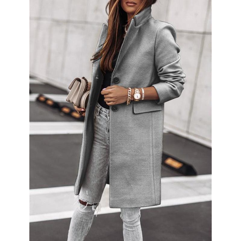 Gray long-sleeve wool coat with front button closure, notch collar, and side pockets.