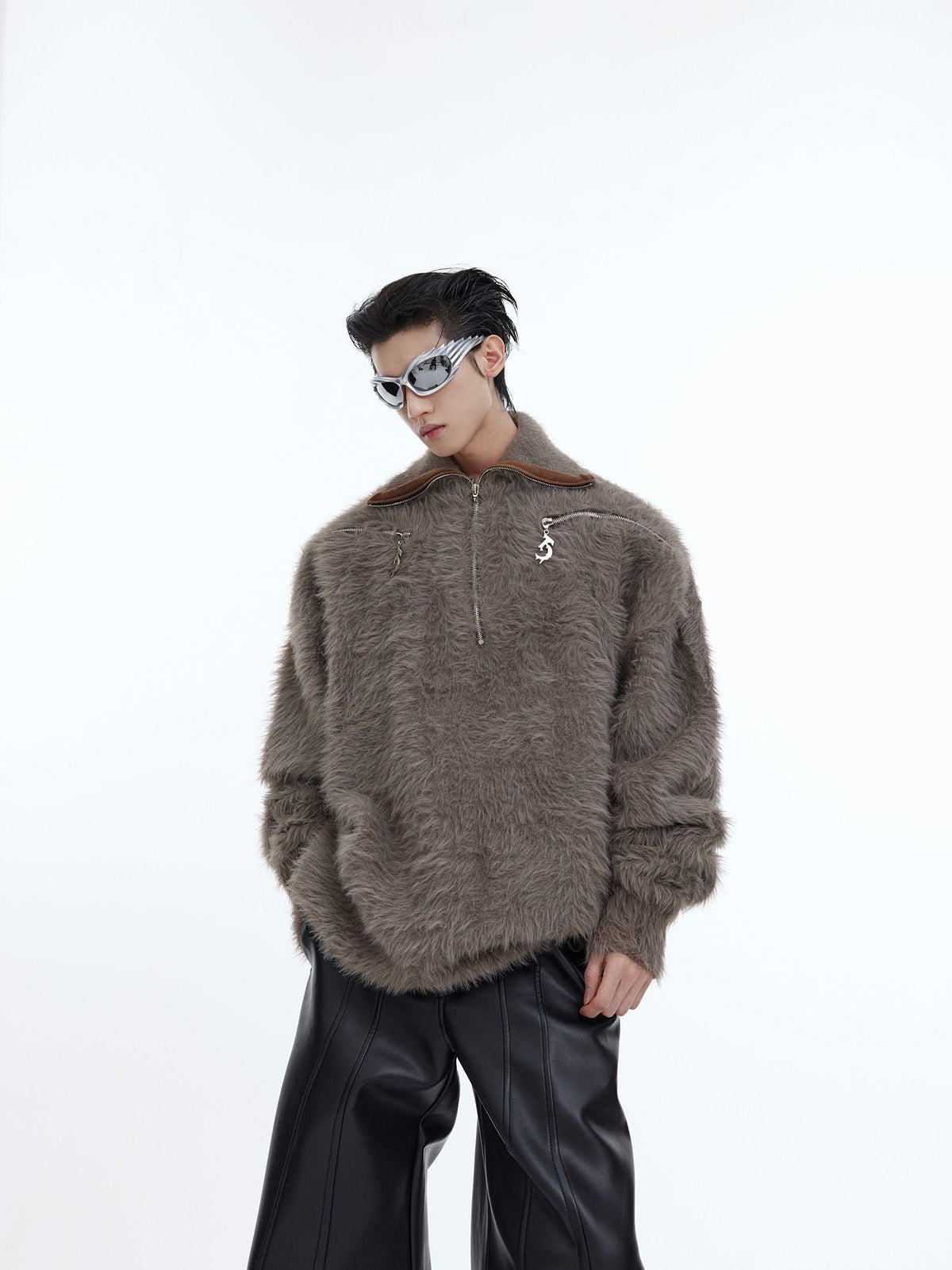 Gray plush zip-up jacket with stand collar and drawstring detail at chest pockets