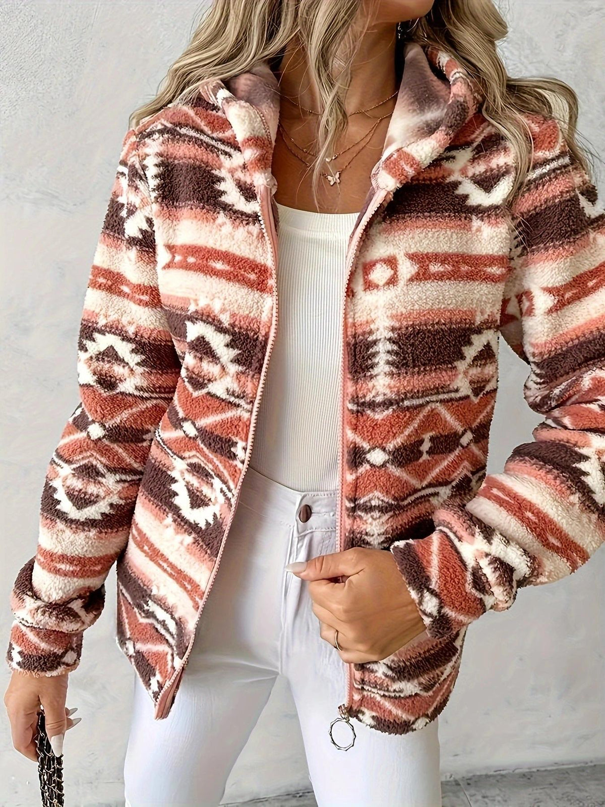 Orange-red and cream geometric fleece hooded zip jacket with long sleeves