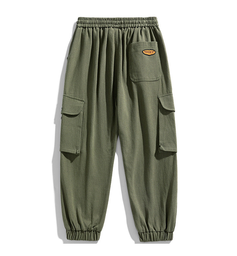 Olive green cargo jogger pants with elastic waistband and flap pockets