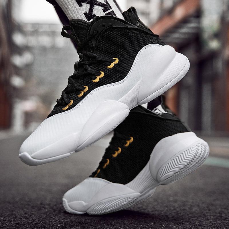 Men's high-top basketball shoe, black and white with gold lace accents