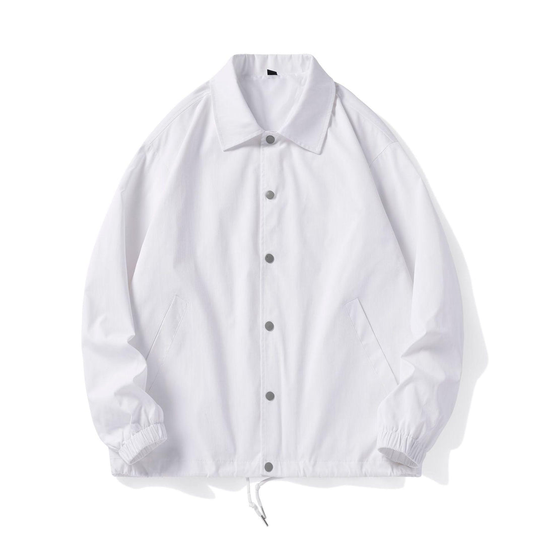 White polo-collar jacket with button front, side pockets, and elastic cuffs