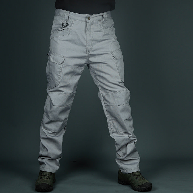 Light gray tactical cargo pants with belt loops and multiple utility pockets