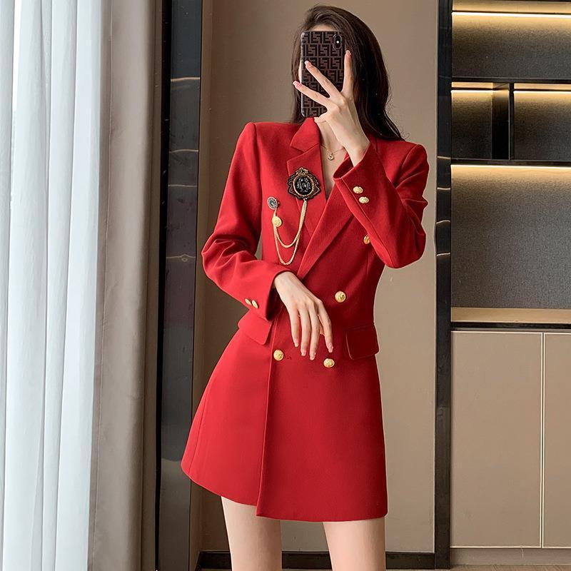 Red long double-breasted coat with gold buttons and wide lapels