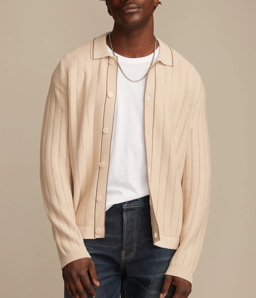 Apricot knit button-front polo sweater with long sleeves and ribbed texture