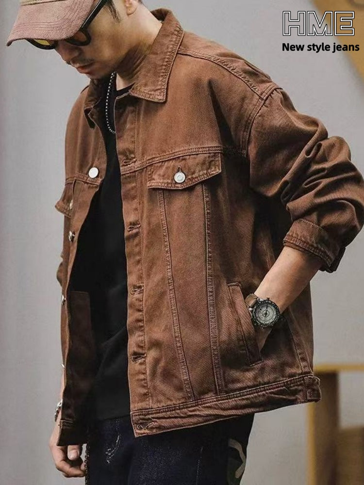 Men's brown denim jacket with buttoned chest pockets and front button placket