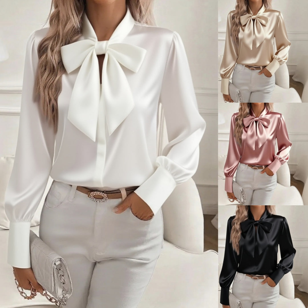 White satin long-sleeve pullover top with oversized bow at the neckline