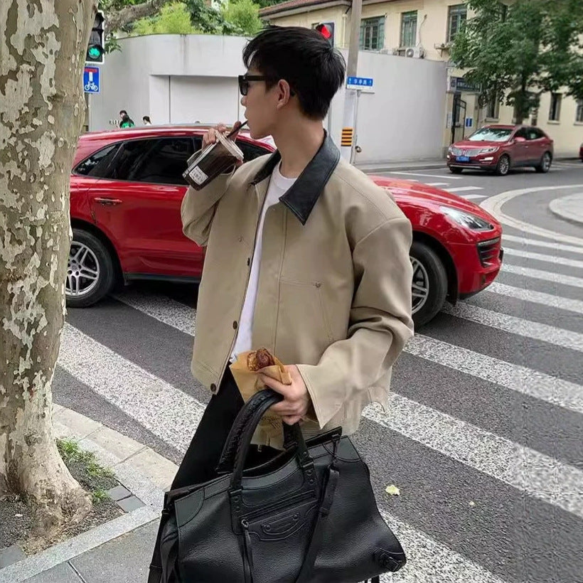 Khaki suede-style jacket with black collar and button front, color-block design