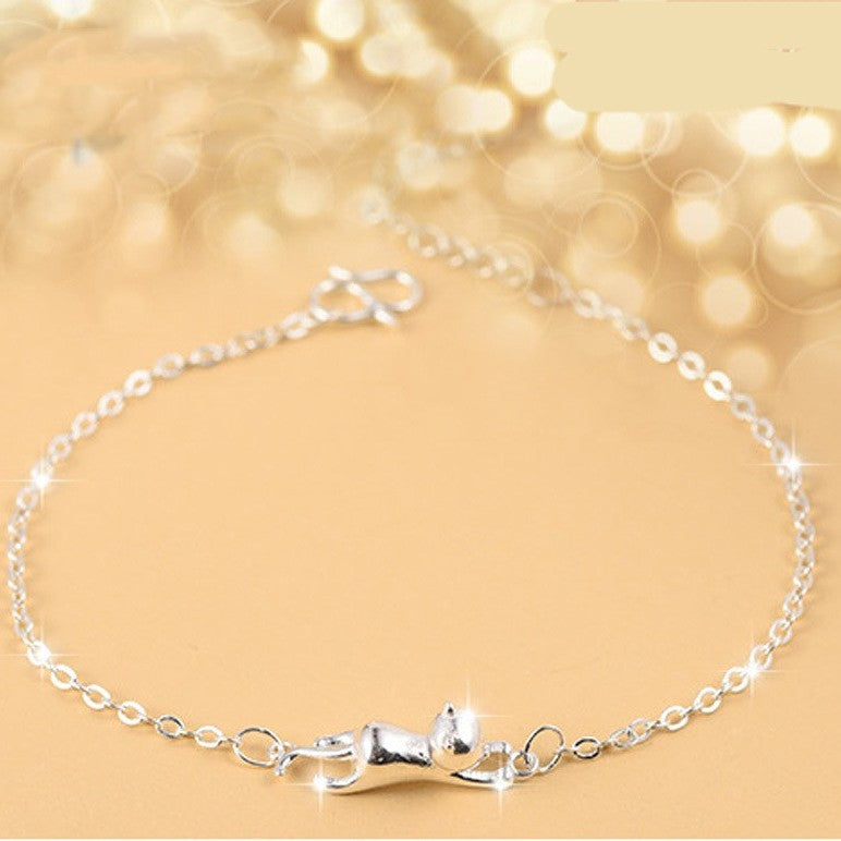 Silver-tone cat-face charm bracelet with small link chain and clasp