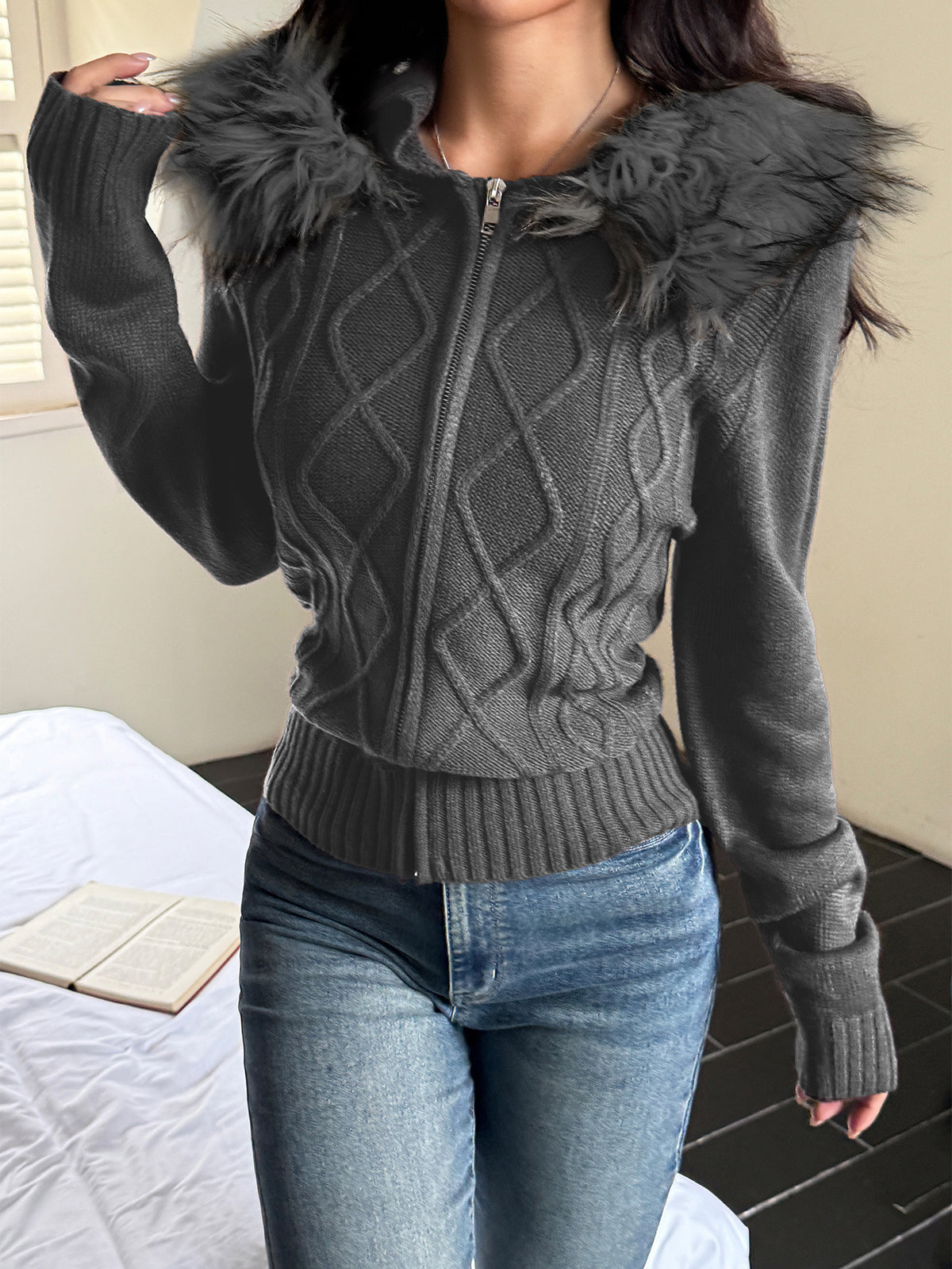 Women's zip-front cable knit sweater coat in dark gray with faux fur hood trim