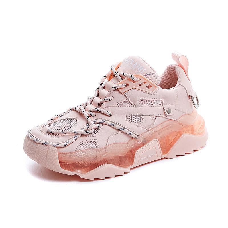 Pink women's chunky mesh sneakers, lace-up front with thick translucent sole.