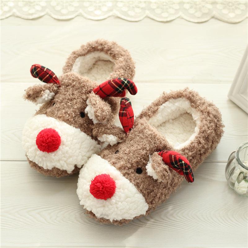 Brown plush elk-themed slip-on slippers with red plaid bows and pom pom accents
