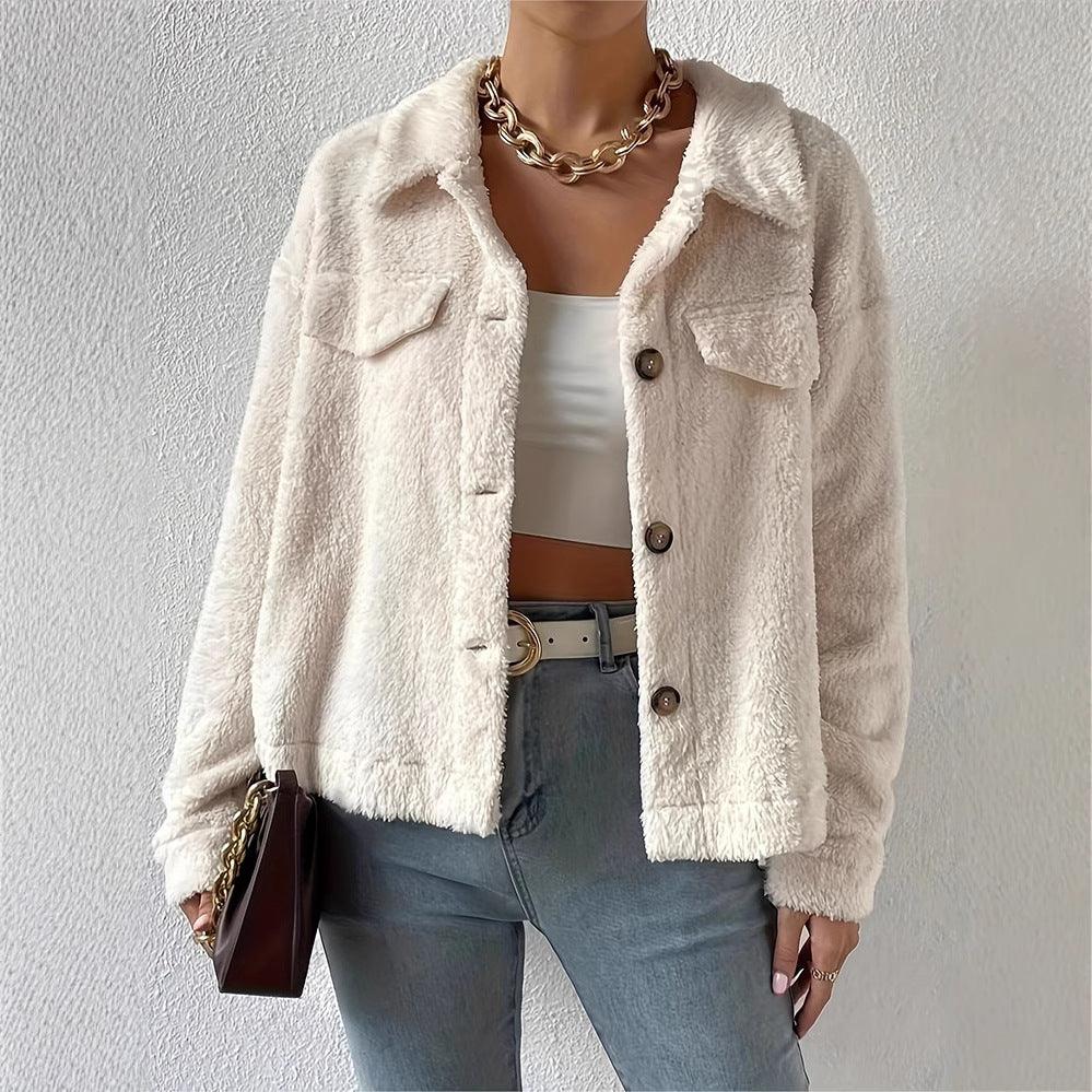 White short lapel coat, button front, two flap pockets, fuzzy texture