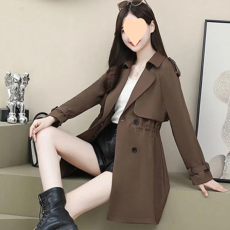 Women's mid-length trench coat in dark brown, loose fit, double-breasted buttons, flap pockets