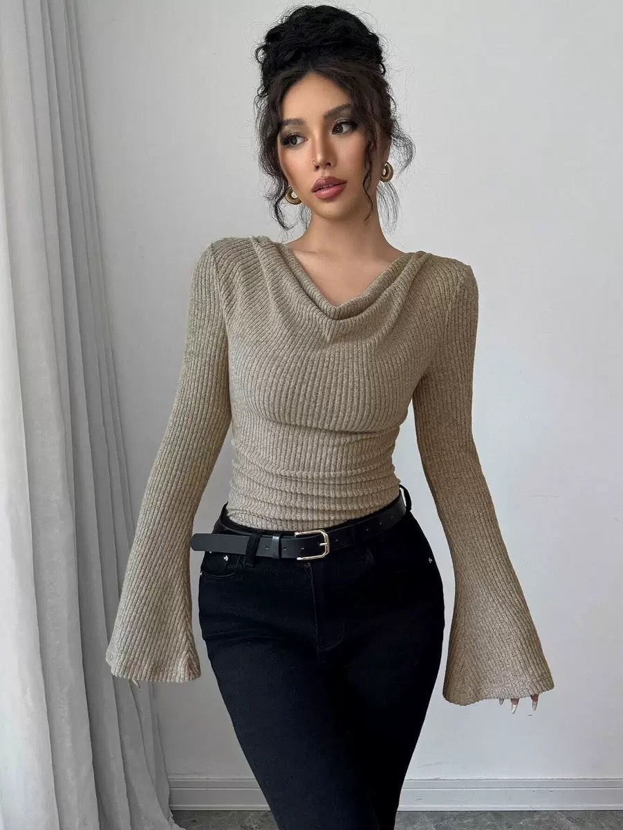 Beige ribbed off-shoulder knit top with draped cowl neckline and flared long sleeves