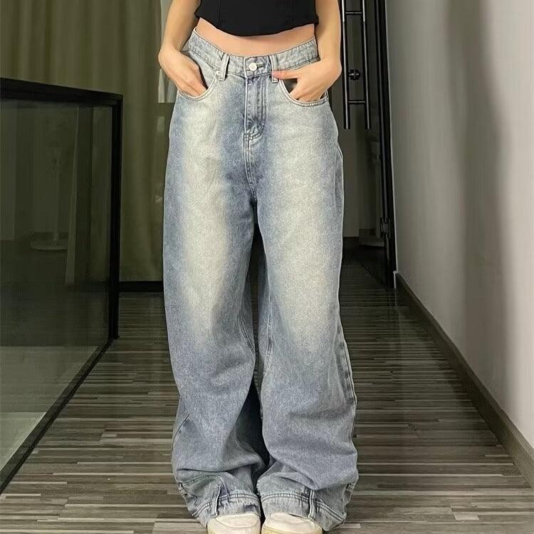 Light blue wide-leg bell-bottom jeans with straight, loose fit and button fly