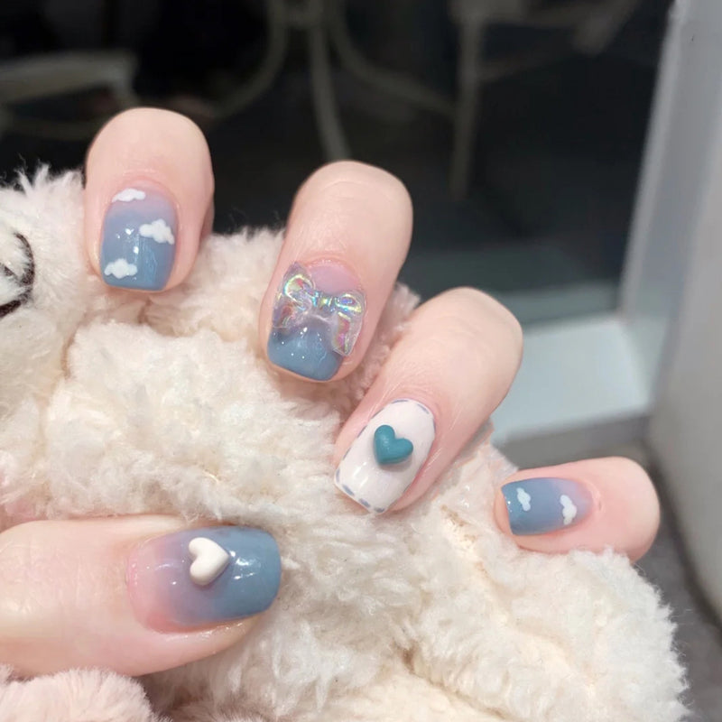 Finished Nail Manicure With Bow Knot Wearing Nails - WOMONA.COM