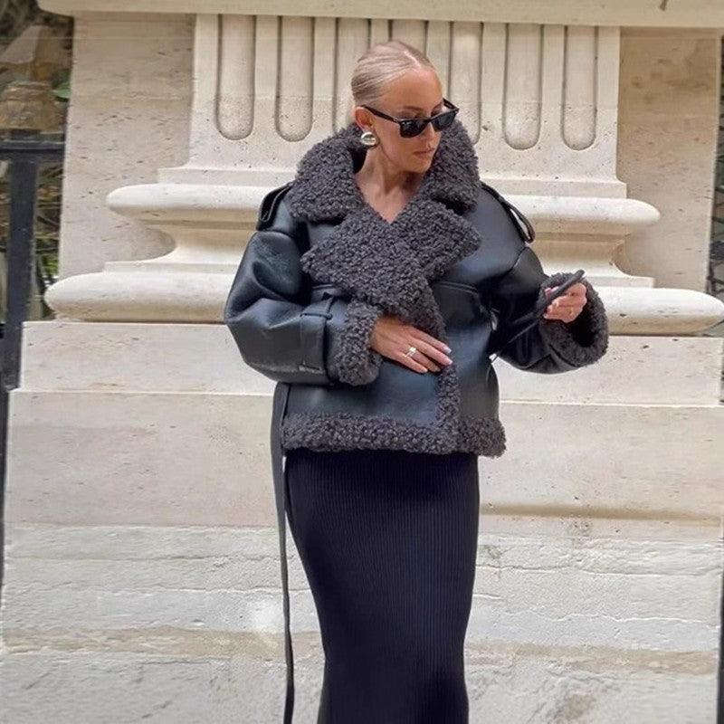 Women’s black PU jacket with faux-fur collar and cuffs, belted waist, long sleeves