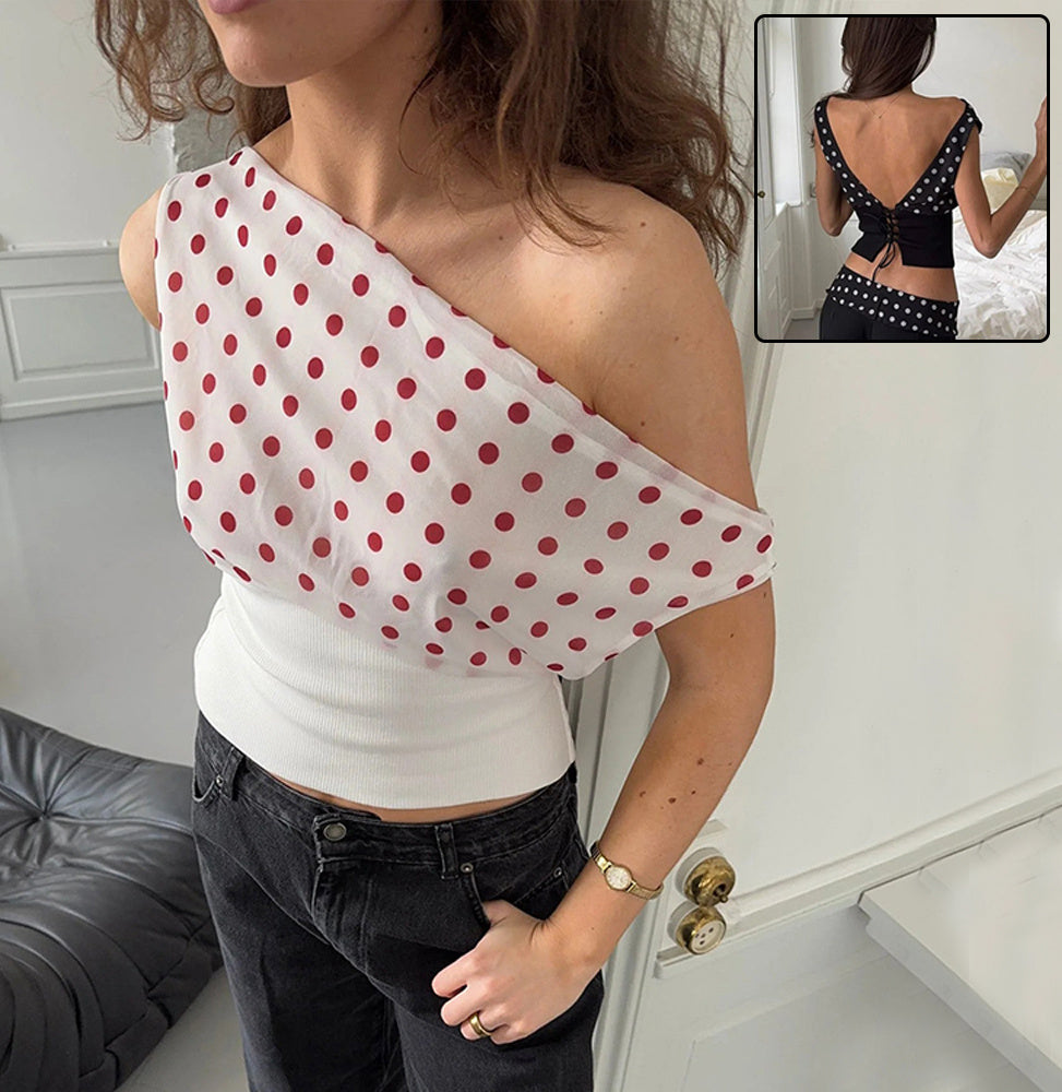 White polka dot one-shoulder crop top with side drape and off-shoulder neckline