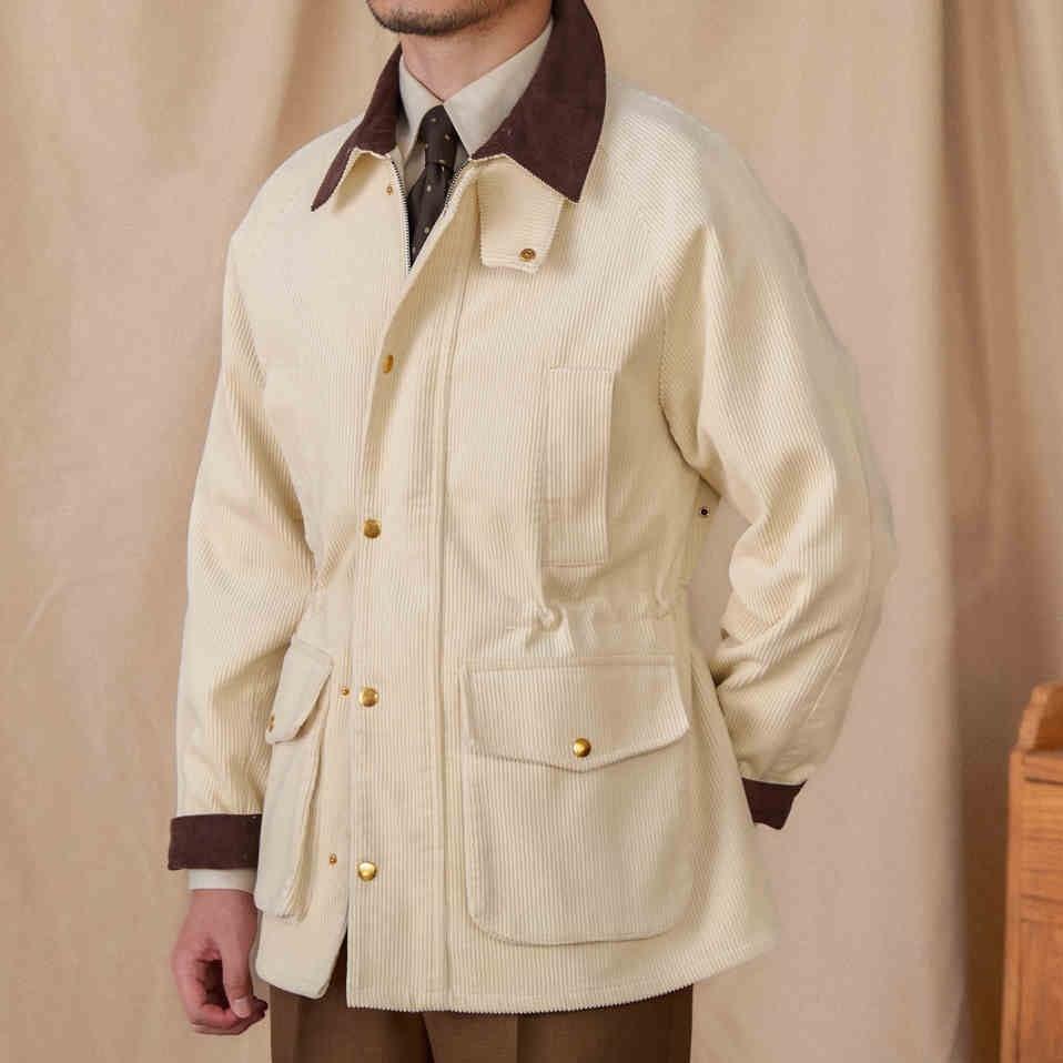 Beige corduroy safari jacket with four front pockets, button front, slim fit