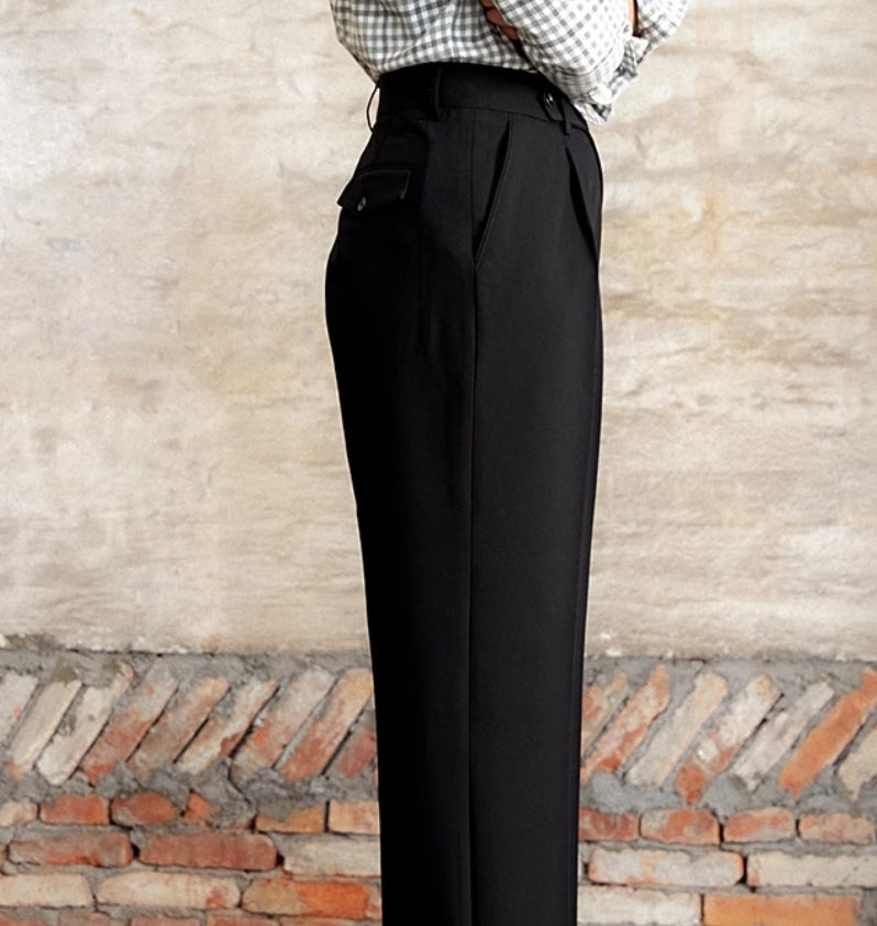 Black high-waist wide-leg trousers with a structured front and deep belt loops
