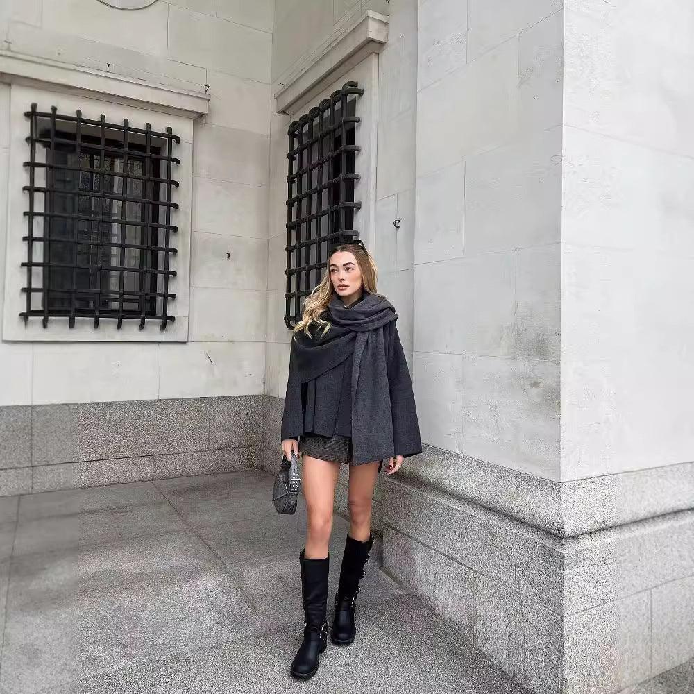 Women's dark gray knitted coat with draped scarf collar, flared asymmetric hem