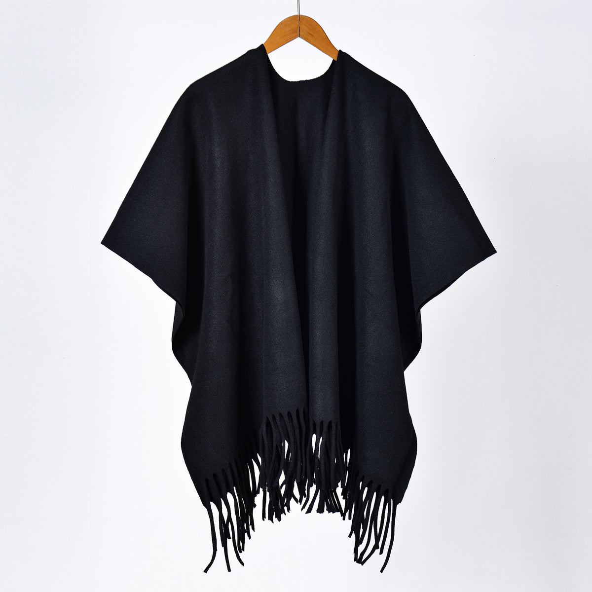 Black jacquard poncho cape with open front and long tassel fringe hem