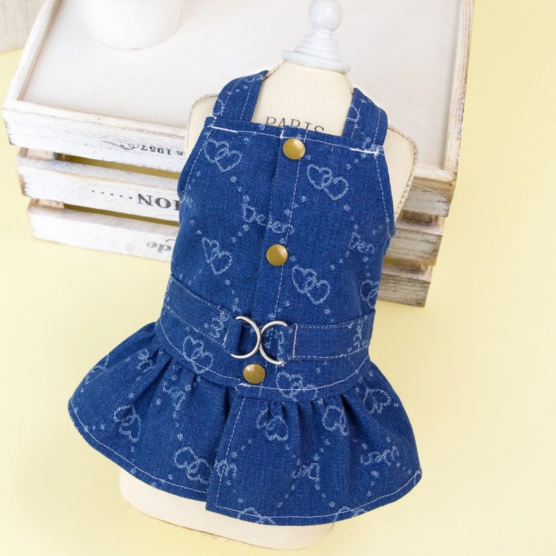 Blue denim dog dress with white heart doodle print, gold buttons and front ring closure