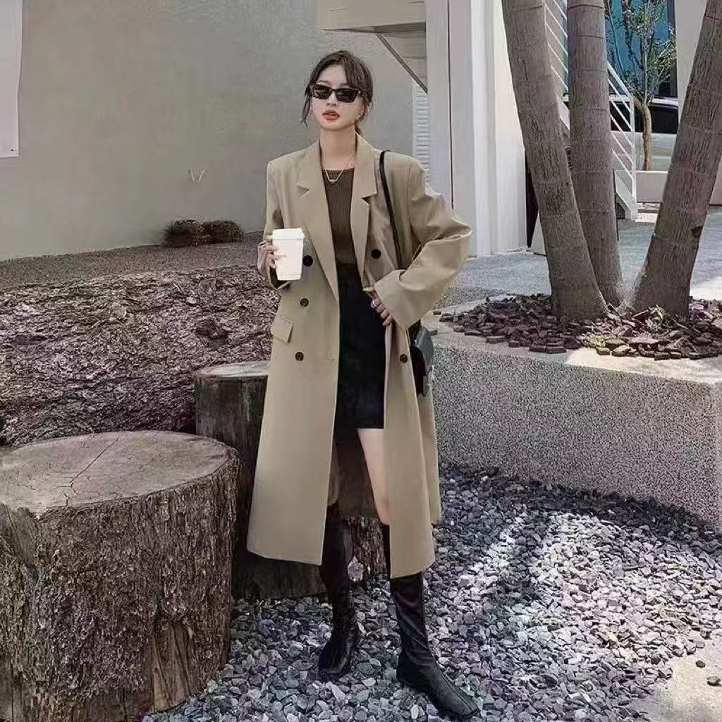Khaki long double-breasted coat with notched lapels and button-front closure